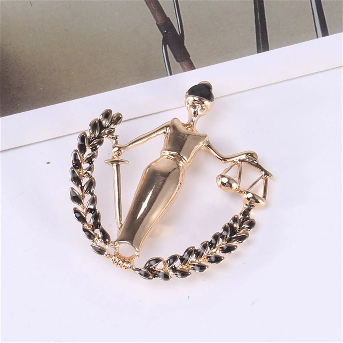 Black Enamel & 18K Gold-Plated Libra Figure Brooch
