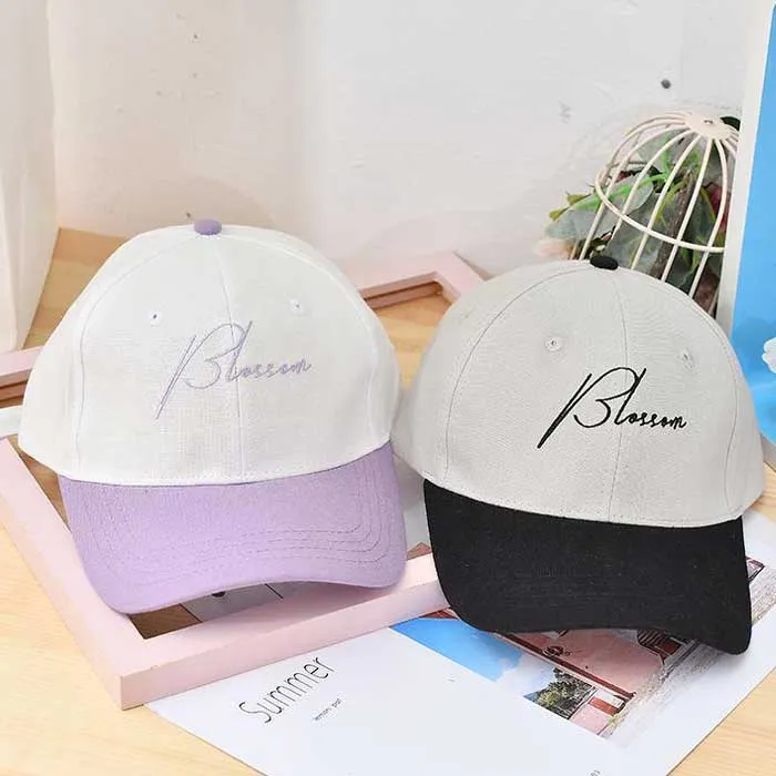 Blossom English Colored Baseball Caps Feature a Floral Design