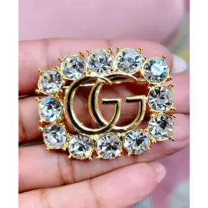 Crystal G Brooch