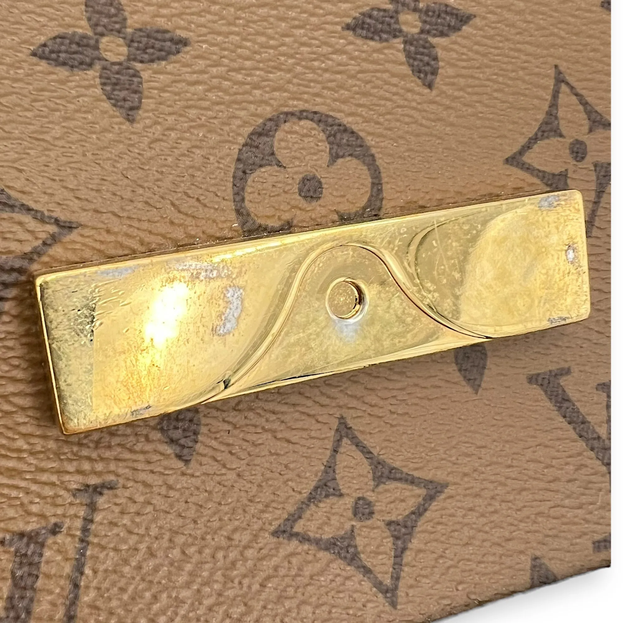 Dauphine Reverse Mini Crossbody bag in Monogram coated canvas, Gold Hardware