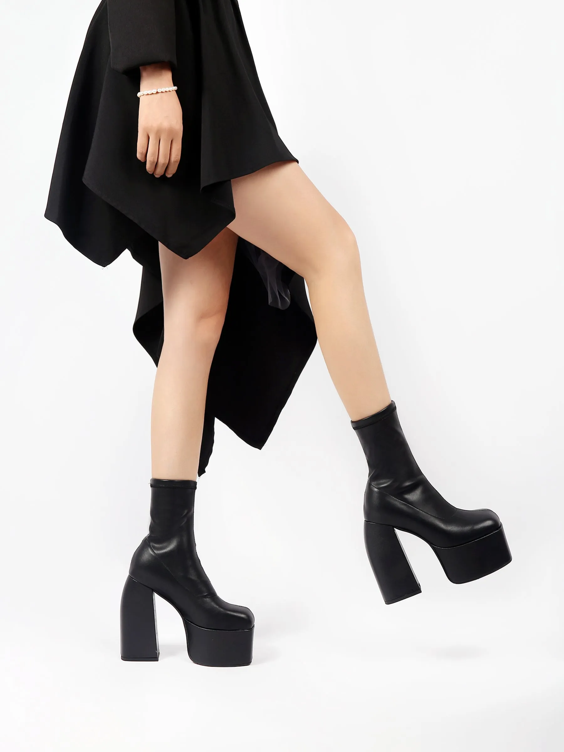 Lug Sole Black Leather Sock Bootie