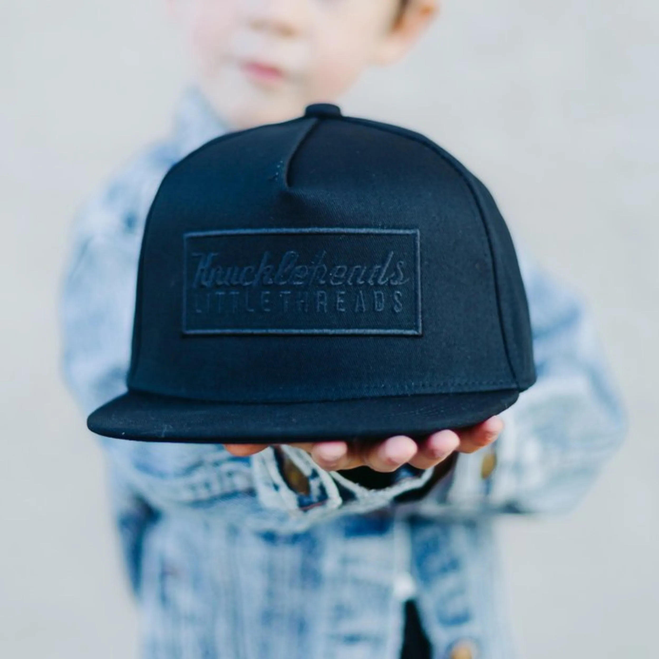 Reformer Black Logo Trucker Hat